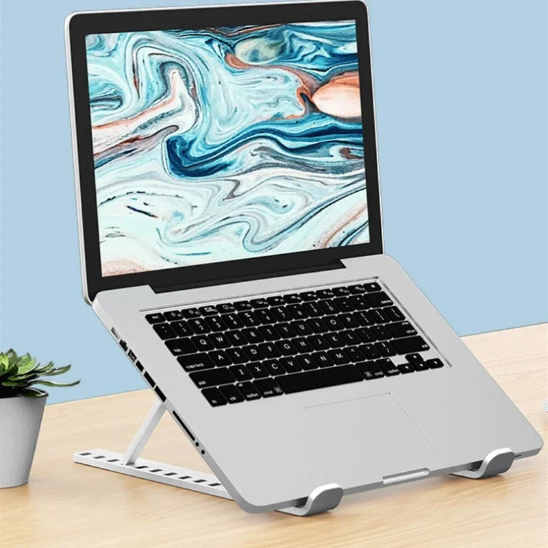 Compact Foldable Laptop Stand – Adjustable, Portable, MacBook Compatible